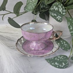Vintage Lusterware Pedestal Teacup & Saucer Pink Gold tea party I believe the material is bone china but I am not certain there are a few imperfection