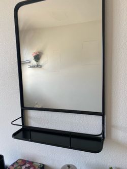 Black mirror with shelf