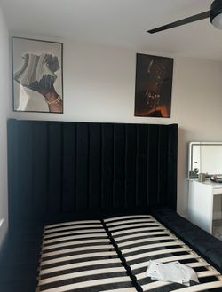 Rick Upholstered Wingback Bed