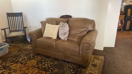 New brown loveseat