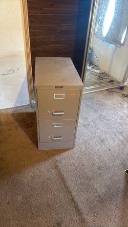 Metal filing cabinet  $30