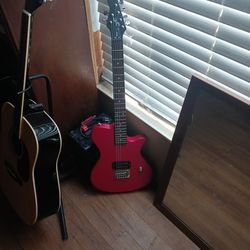 Red First Act beginner guitar 
