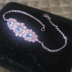 Beautiful Blue Topaz Bracelet,  in Solid Sterling Silver. It Measures 7" wide.