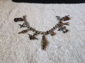 WW2 charm bracelet plus 70 pokemon cards