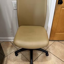 Tan Armless Rolling Office Chair