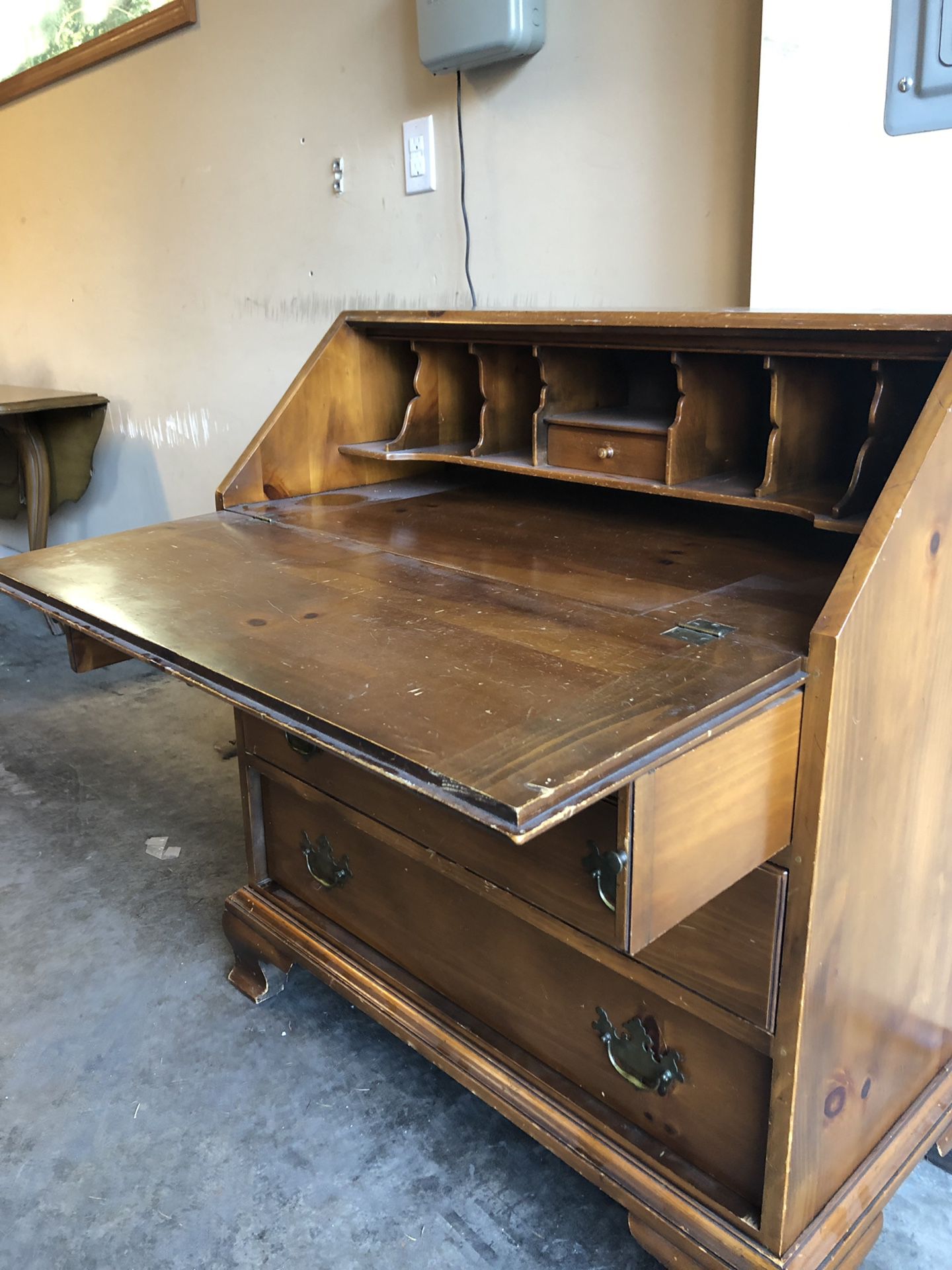 Vintage Secretary Desk. 18” deep, 38” tall, 34” wide. Three drawers and fold down desk. Great for small spaces.