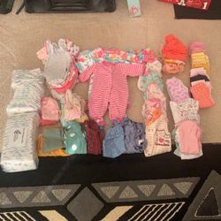 Bundle deal preemie And  newborn baby clothes and diapers