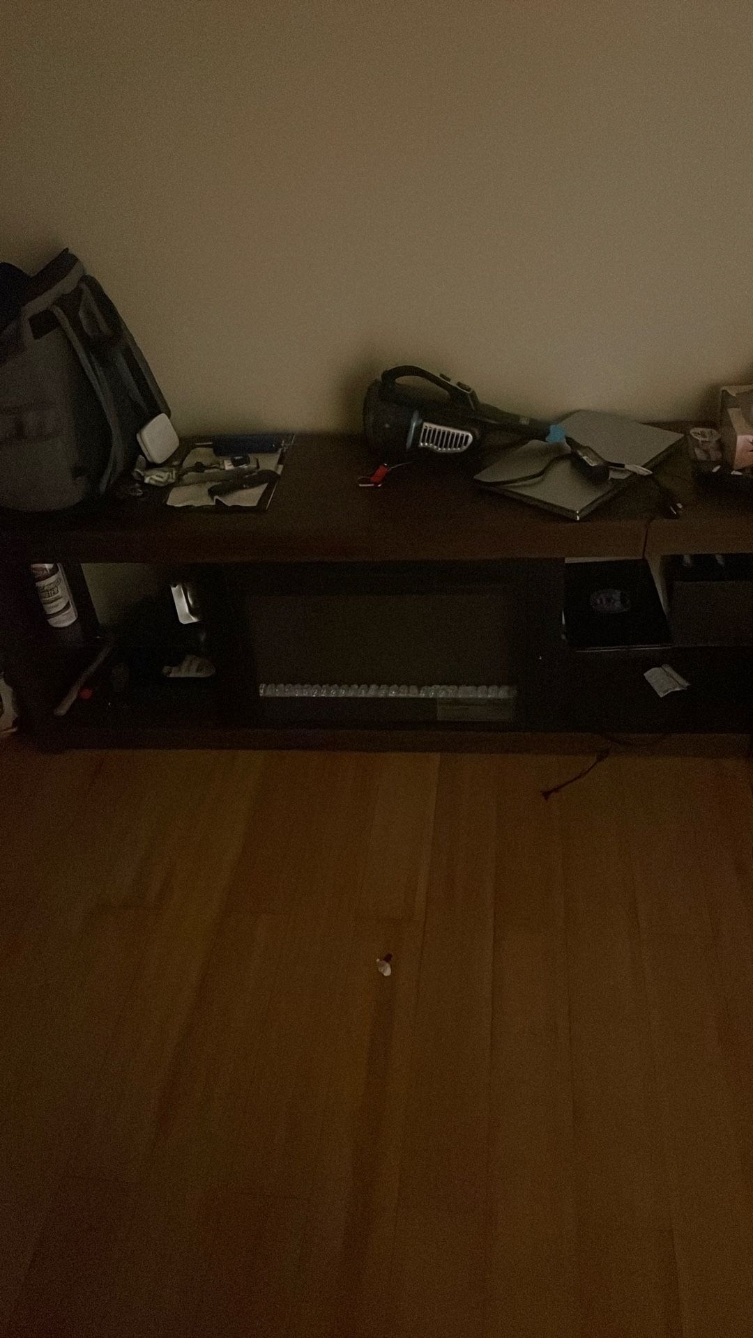 desk/stand (has heating fireplace thing)