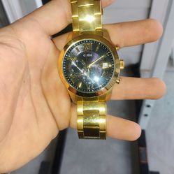 Gold plated watch.