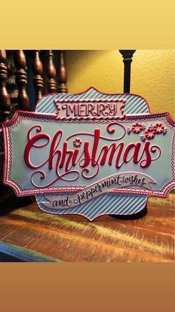 RAZ imports peppermint candy tin sign