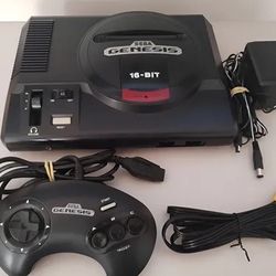 Sega Genesis Model 1, which is a vintage 16-bit home video game console released in the late 1980
