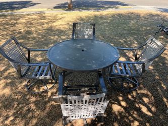 Metal Patio Table with swivel chairs