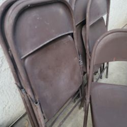 7 Folding Metal Chairs 