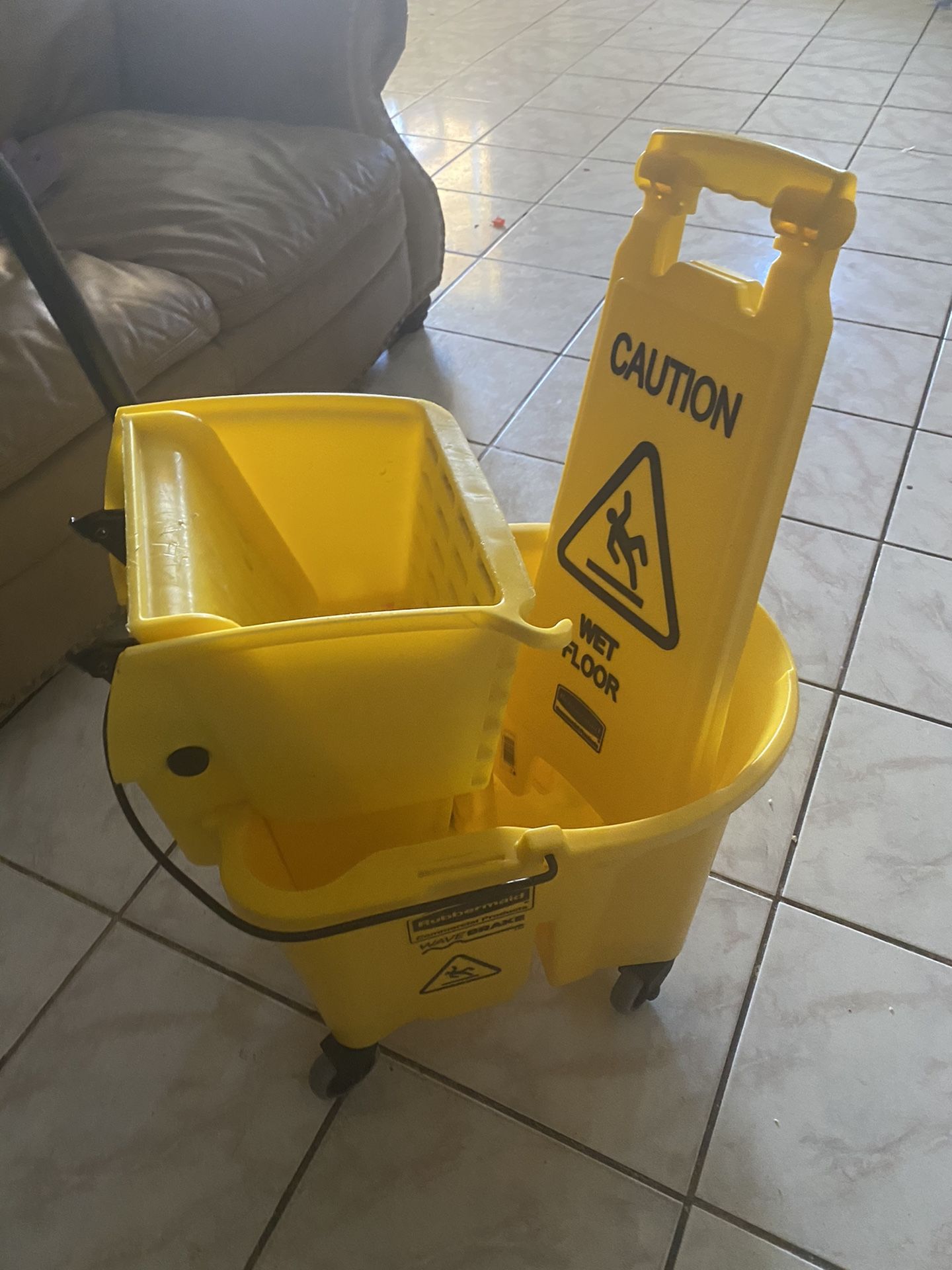 Mop bucket with sign