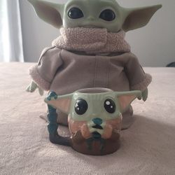 Baby Yoda plush toy and sculpted ceramic mug