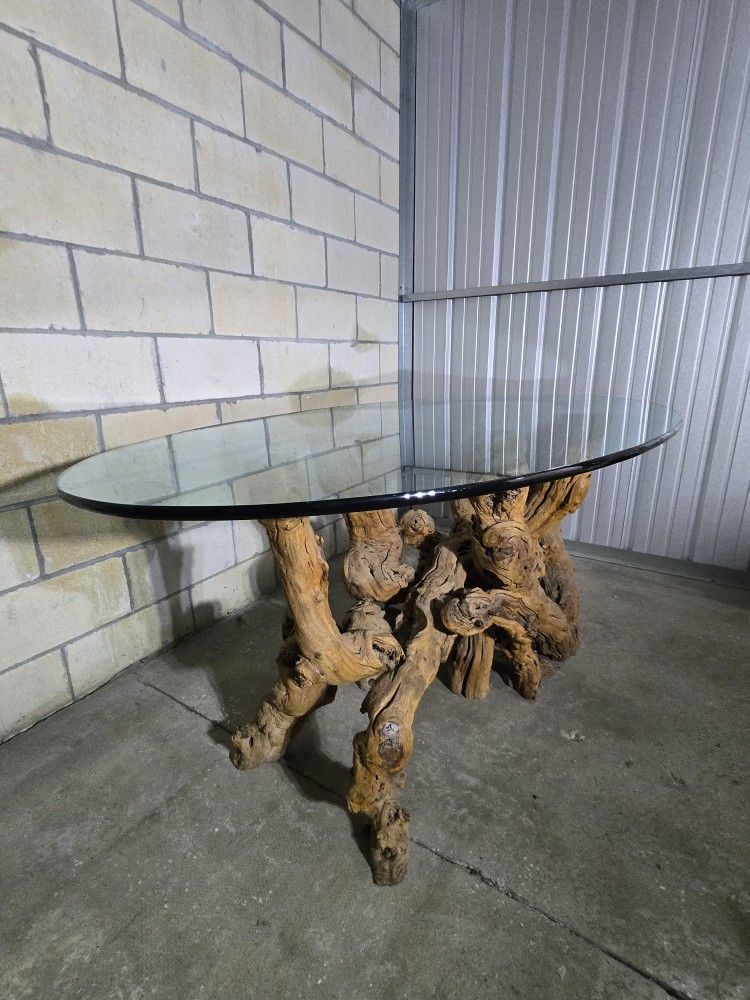Driftwood Elegance: Glass-Top Dinning Room Table