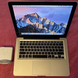 Mid 2010 MacBook Pro 13 inch, 2.4 GHz Core 2 Duo, 4 GB RAM, 120 GB SSD.