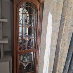Wood and glass Curio Cabinet.