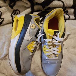 Yellow smiley face Nike air max