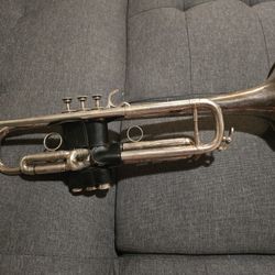 Trumpet, 2 Mouthpieces, 4 Mutes, And A Case For The Trumpet And Mutes