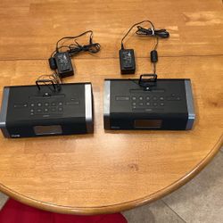 2 ihome Clock Radios  Has a plug for an iPhone on top and on the backside of the radio. Clocks are in excellent condition and they work great. $30 ea 