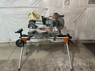 Rigid 12” compound sliding miter saw with stand.
