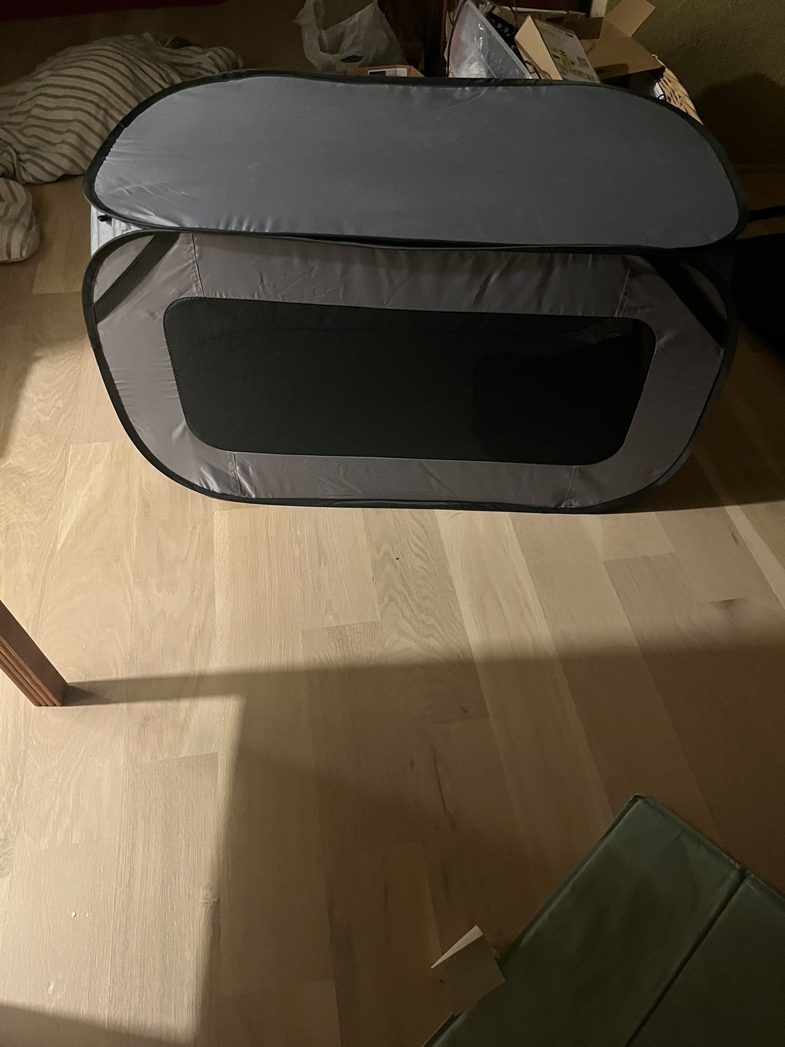 DOG POP UP CRATE 20 1/2"w x 37"deep x 20"high; cross streets are Arapaho & Waterview