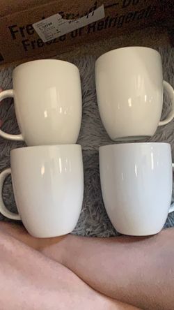 Four piece coffee cup set