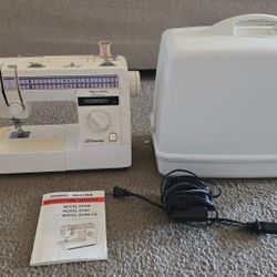 JCPenny Sewing Machine with case and accessories. Very good condition. 