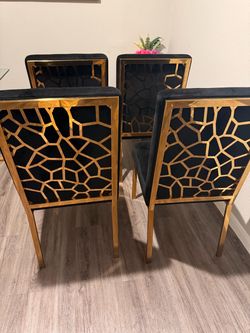 Set of 4 chairs in excellent condition, with no stains or tears.