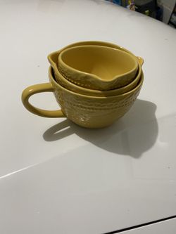 3 yellow bowls