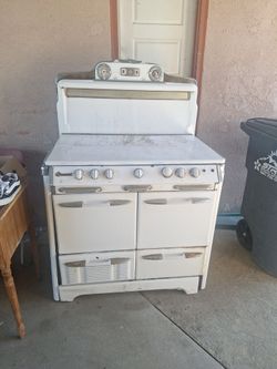 Vintage stove  best offer. It is located at pond rd and 43  turn at store and first house on the right