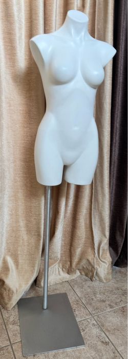 Female upper body mannequin with sturdy adjustable metal stand. Great for displaying women’s clothing, dresses, tops, swimwear, jackets, or accessorie