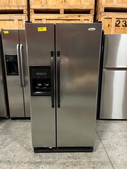 Whirlpool side by side refrigerator in stainless steel
