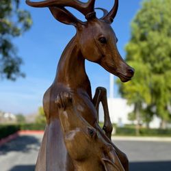 wooden hand carved deer sculpture 