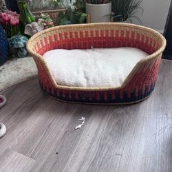 DOG BED. wicker dog bed. Barely used so cute.