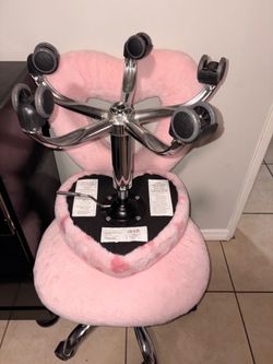 Pink rolling chair