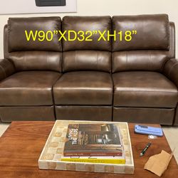 New Dual power recliner Sofa with power adjustable headrest.