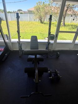 NordicTrack Treadmill y banco de pesas