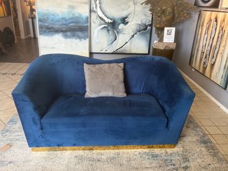Blue velvet sofa