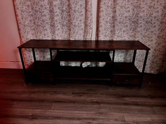 63” TV Stand – Fits 75” TV, Charging Station + Drawers | $125 on Amazon