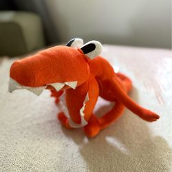 Orange plush stuffed animal character from the Roblox game "Rainbow Friends”