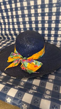 One size fits all navy blue sun head with a floral bow