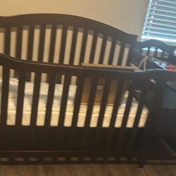 crib with attached changing table 