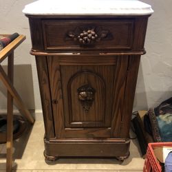 Antique side cabinet table marble top what wheels skeleton key hole grape design pull handle