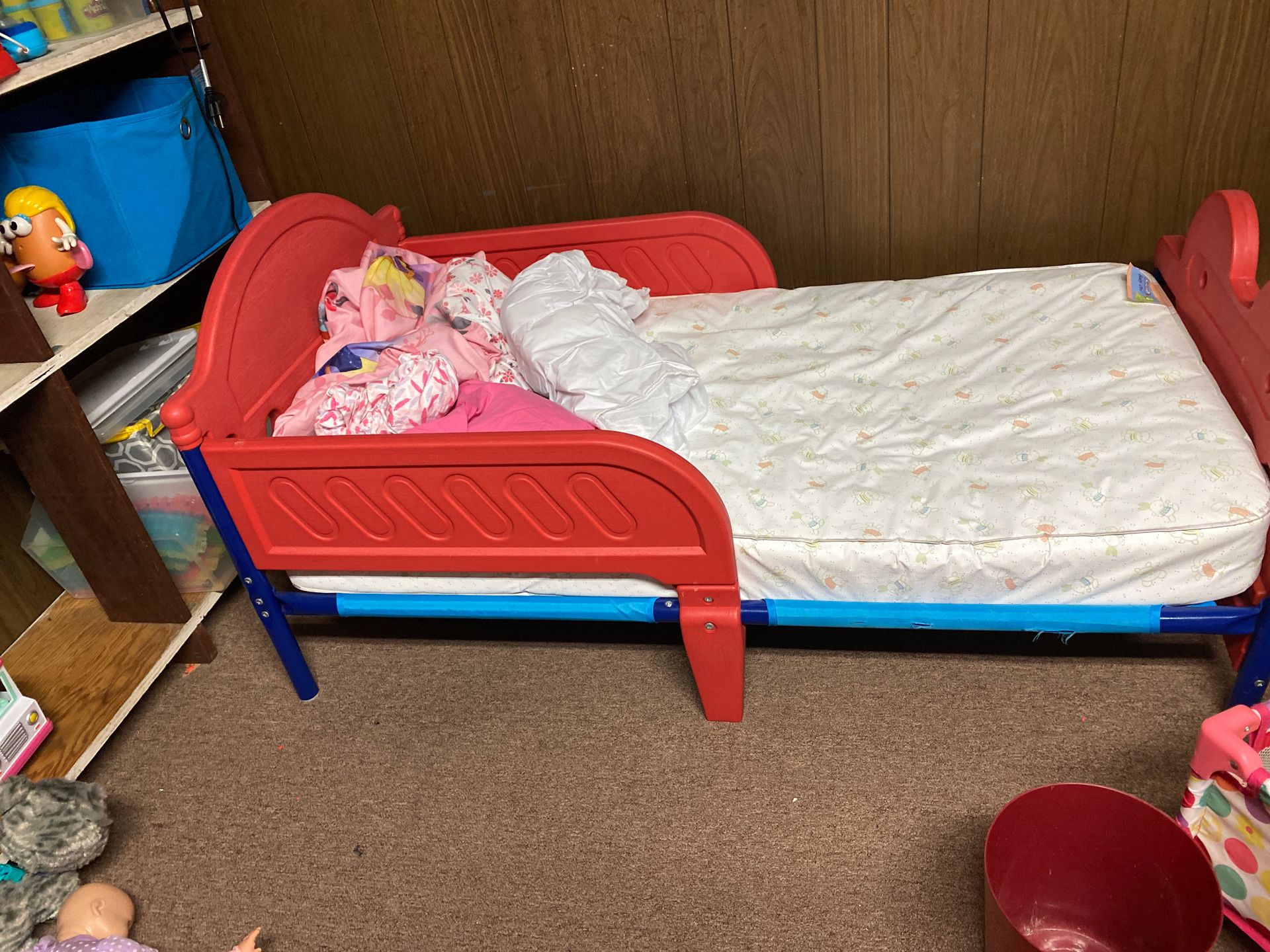 Toddler bed with mattress and mattress protector