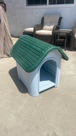 Blue house with green roof
