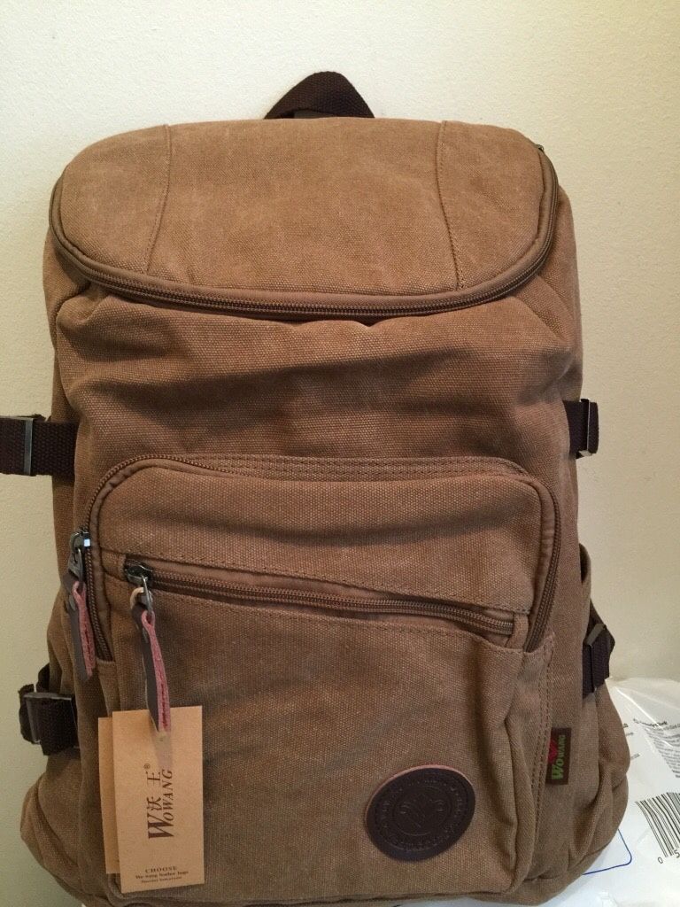 Canvass backpack and it can fit 15.6inch laptop(brand new)