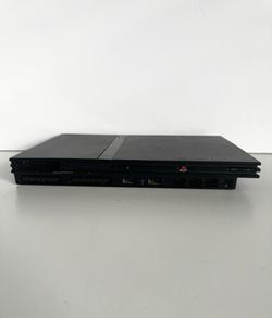 PS2 Slim (Not Working) Bundle – Games, Cords, & Controllers Included