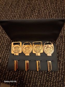 Four Cadillac Gold Blanks Keys 